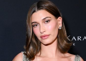 Hailey Bieber’s Silver Cat-Eye Nails Absolutely Glow From Within—See the Photos