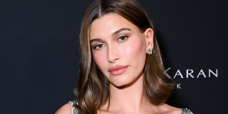 Hailey Bieber’s Silver Cat-Eye Nails Absolutely Glow From Within—See the Photos