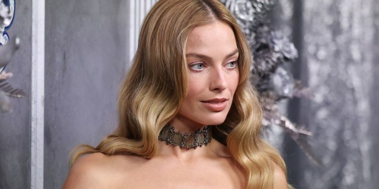 Margot Robbie’s New Bob and Bangs Are the Antithesis of Her Wuthering Heights Hair – See Photos