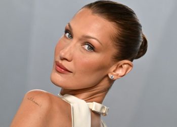 Bella Hadid’s Tousled Bombshell Updo Is So ’90s Pamela Anderson—See the Photos