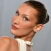 Bella Hadid’s Tousled Bombshell Updo Is So ’90s Pamela Anderson—See the Photos
