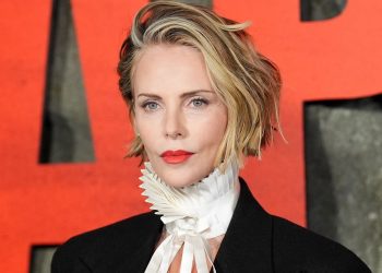 Charlize Theron’s Anti-Spring Manicure Is Oddly Refreshing—See the Photos