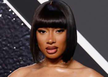 Megan Thee Stallion Wore a Blonde French Roll on Michelle Obama’s Podcast—Watch the Video